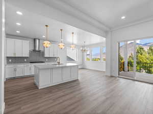 Kitchen featuring Sliding glass door to covered back patio.