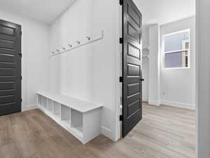 Mudroom with bench and hooks