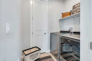 Laundry room with washer and dryer