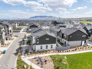 Aerial view of residential area with a mountainous background