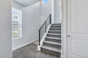 Entryway, stairs to the 2nd floor, door to the basement
