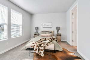 Carpeted bedroom #3 featuring baseboards