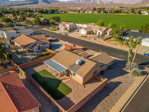 Aerial view of residential area featuring a mountain backdrop