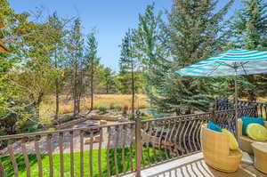 Balcony with view of scattered trees