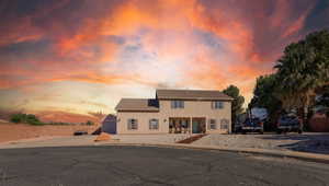 Traditional-style home with stucco siding
