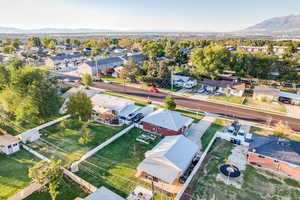 Aerial perspective of suburban area featuring a mountainous background