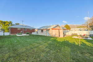 View of fenced backyard