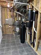 Utility room strapped water heater (installed in March of 2025)