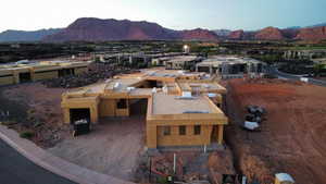 Aerial view of residential area with a mountain backdrop