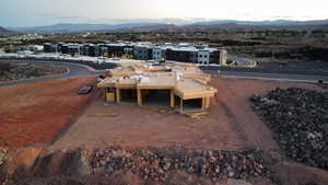 Aerial view of residential area featuring a mountain backdrop
