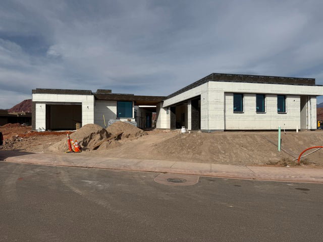 Property in mid-construction featuring an attached garage