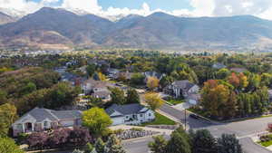 Aerial view of residential area with a mountain backdrop