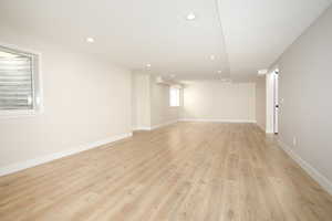 Unfurnished room featuring recessed lighting and light wood finished floors