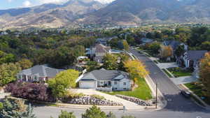 Aerial view of residential area with a mountainous background