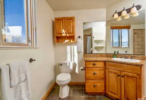 Bathroom featuring vanity, a textured ceiling, and a shower with curtain