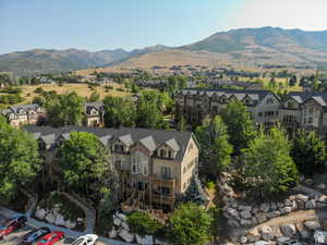 Aerial perspective of suburban area featuring mountains