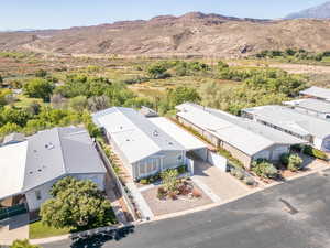Aerial perspective of suburban area with a mountain backdrop