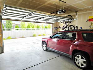 Garage featuring a garage door opener