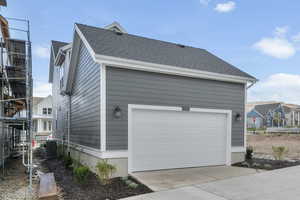 Garage featuring driveway