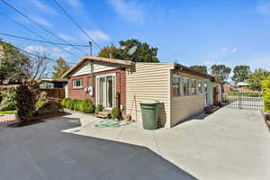 Rear view of house with brick siding
