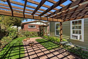 View of patio / terrace with a pergola and cooling unit
