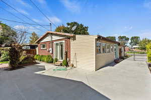 View of front of home featuring brick siding