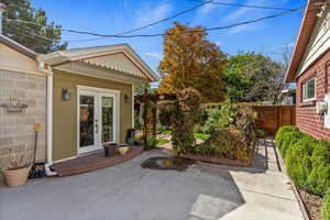 View of patio featuring a deck and french doors