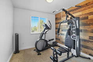 Bedroom with wood wall