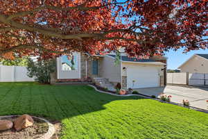 View of front of home and landscaping