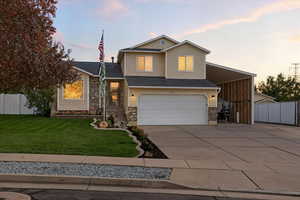 View of front of home at Twilight