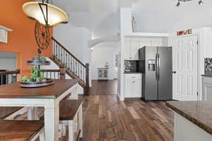 Kitchen, dining area looking towards living room