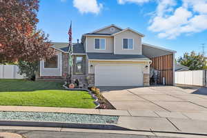 View of front of home with garage, carport and RV Parking