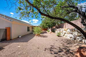 View of fenced backyard