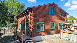 View of side of property with log siding