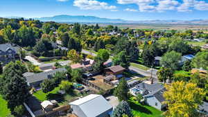 Aerial view of residential area featuring mountains