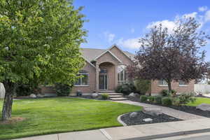 View of front of home with brick siding