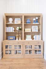 Detailed view of baseboards and wood finished floors