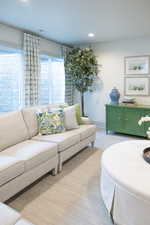 Living area featuring recessed lighting and baseboards