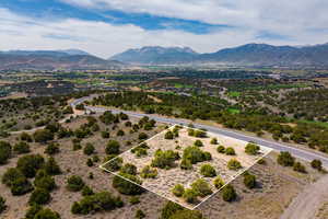 Overview of rural landscape featuring mountains and property boundaries highlighted