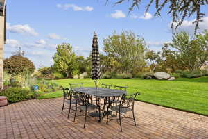 View of patio with outdoor dining space
