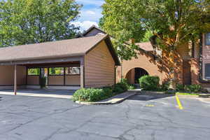 View of partially covered parking lot