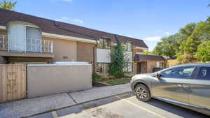 Front entrance; uncovered parking