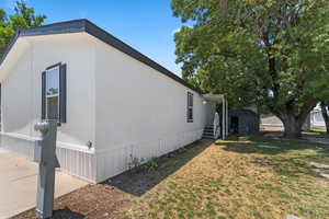 View of home's exterior featuring a lawn