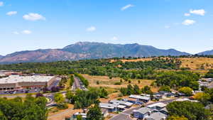 Drone / aerial view of a mountainous background