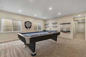 Recreation room with light carpet, recessed lighting, and pool table