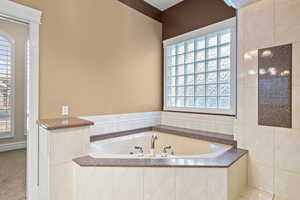 Bathroom featuring a garden tub