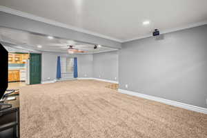 Unfurnished room with recessed lighting, crown molding, carpet floors, a ceiling fan, and baseboard heating