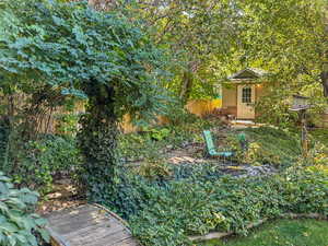 View of yard with an outdoor structure