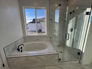 PRIMARY SUITE BATH W/ SEPERATE TUB & SHOWER!