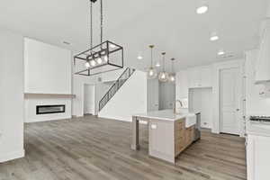 GREAT OPEN SPACE IN KITCHEN W/ LARGE ISLAND BAR & LARGE PANTRY!    (PICTURE OF PREVIOUS BUILT HOME-OPTIONS, COLORS AND MATERIALS MAY VARY)